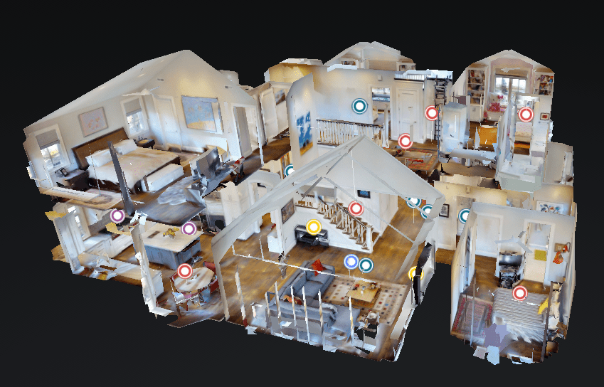 A 3D floor plan of a house showing various rooms including a bedroom, living room, kitchen, and dining area, with different objects and furniture.