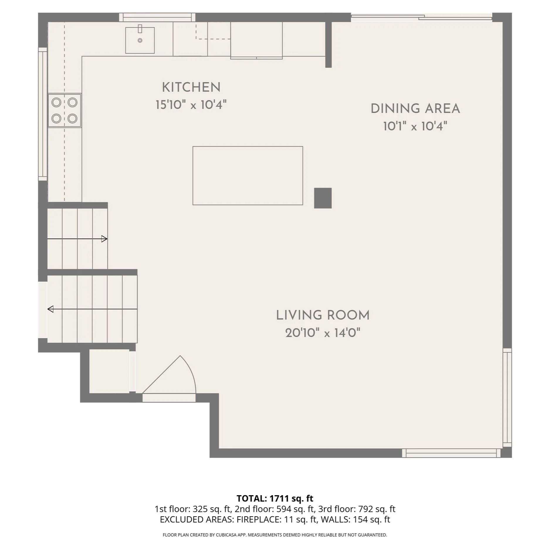 Floor plan of a home showing a living room, kitchen, and dining area with dimensions, stairs, and entrances.