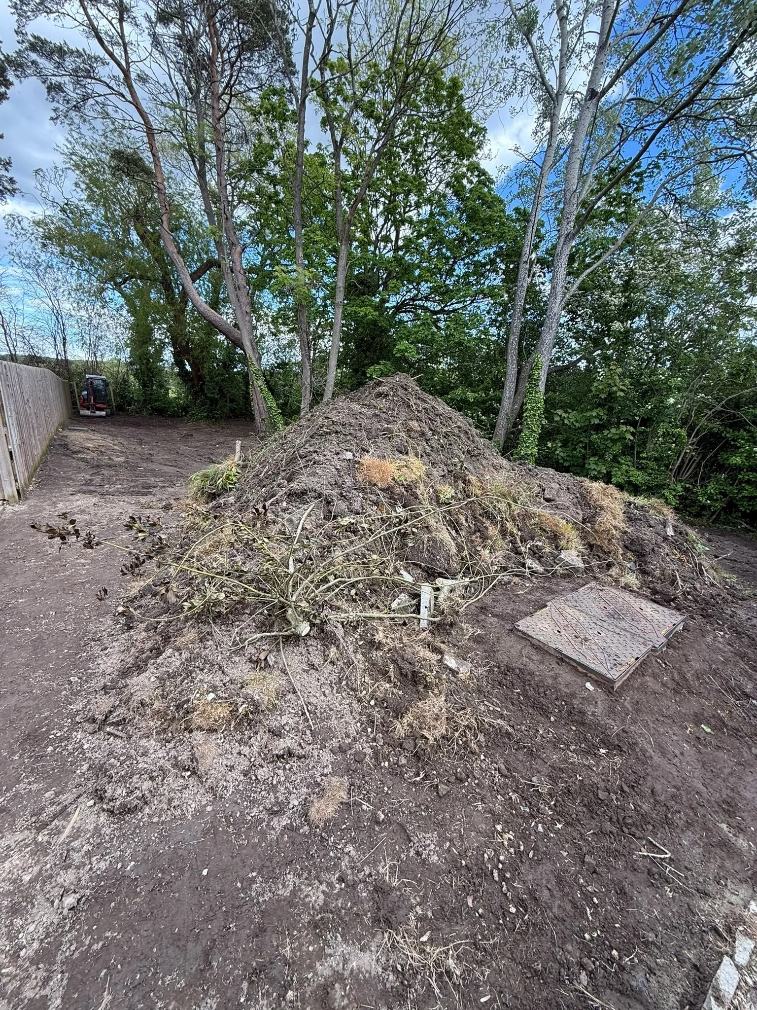 Excavated soil and vegetation during habitat ground preparation