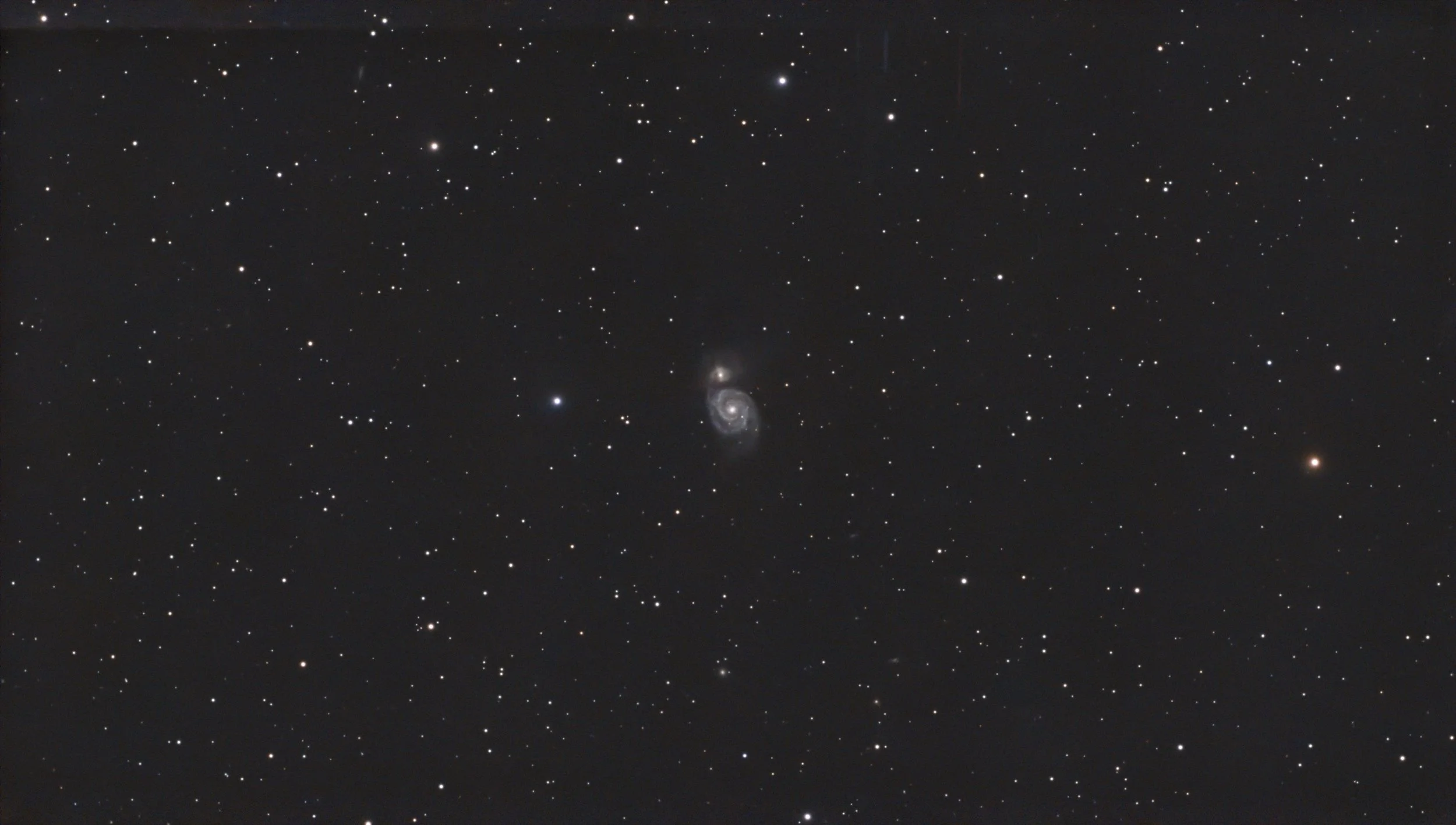 Whirlpool Galaxy (M51) interacting with NGC 5195. Limiting post-processing helps retain structural detail and tidal features produced by their gravitational interaction.