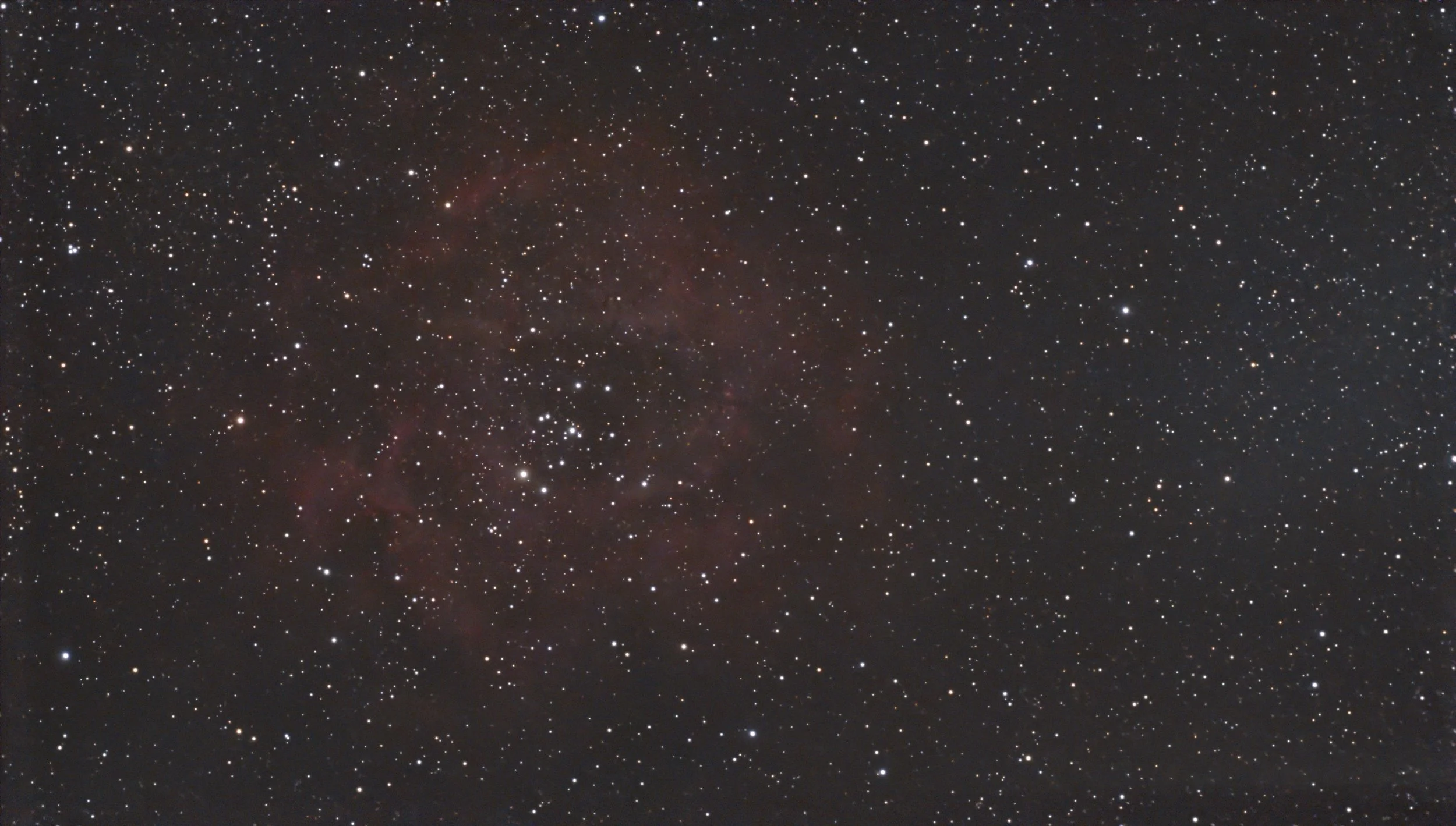 Rosette Nebula (NGC 2237), a star-forming region in Monoceros. This minimally processed image retains the faint hydrogen emission and the central star cluster’s relative brightness.
