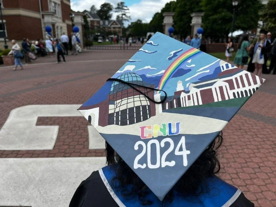 Here's me on my graduation day wearing my painted cap. So proud of myself for earning my Bachelor's!