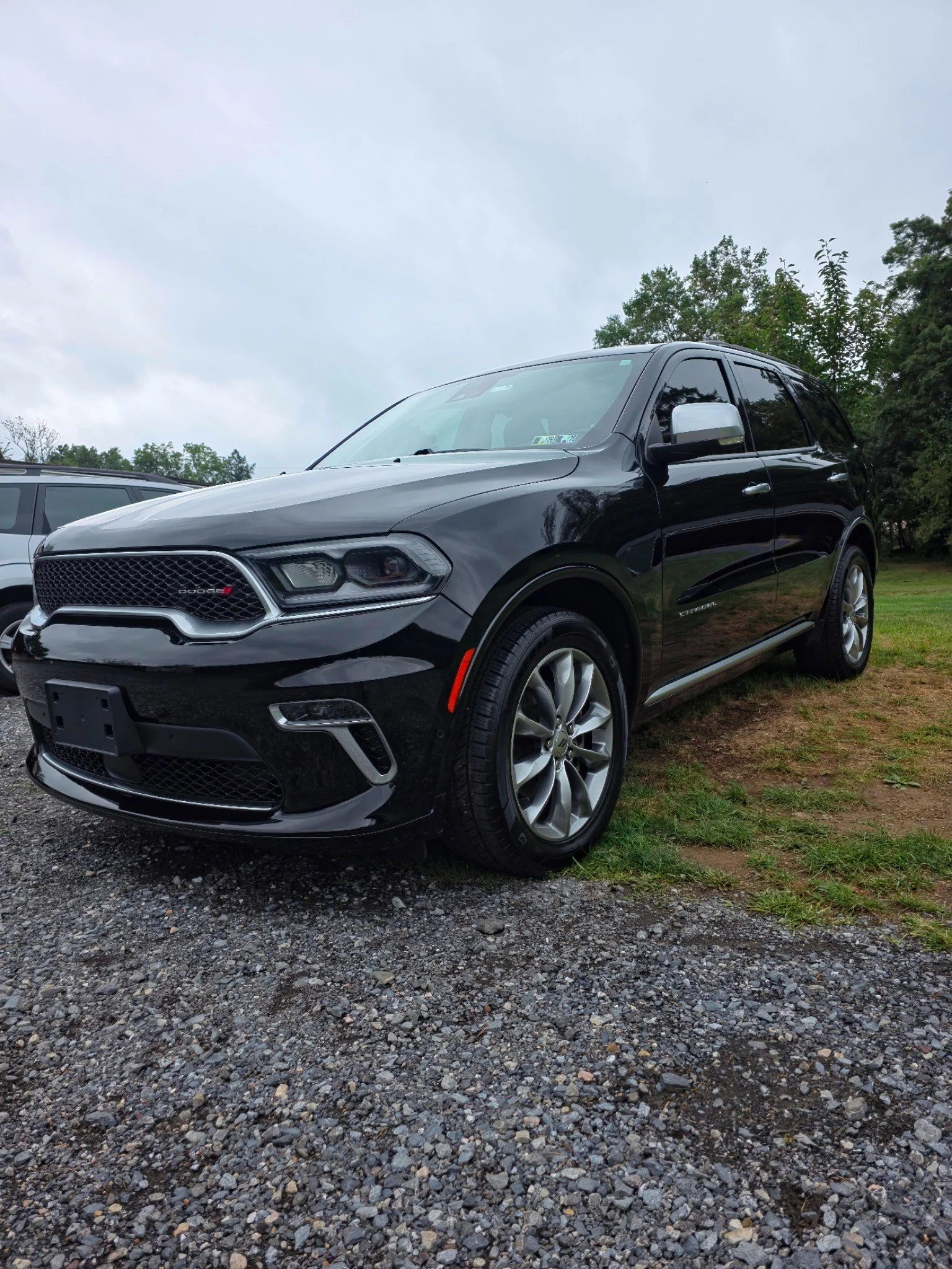 A black Dodge SUV after professional exterior detailing by 717 Detailing