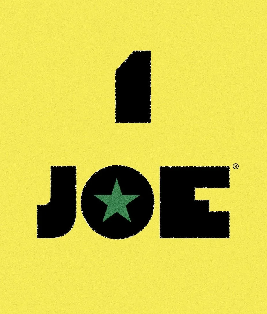 Yellow background with the word 'LOVE' where the 'O' is replaced by a black circle containing a green star.