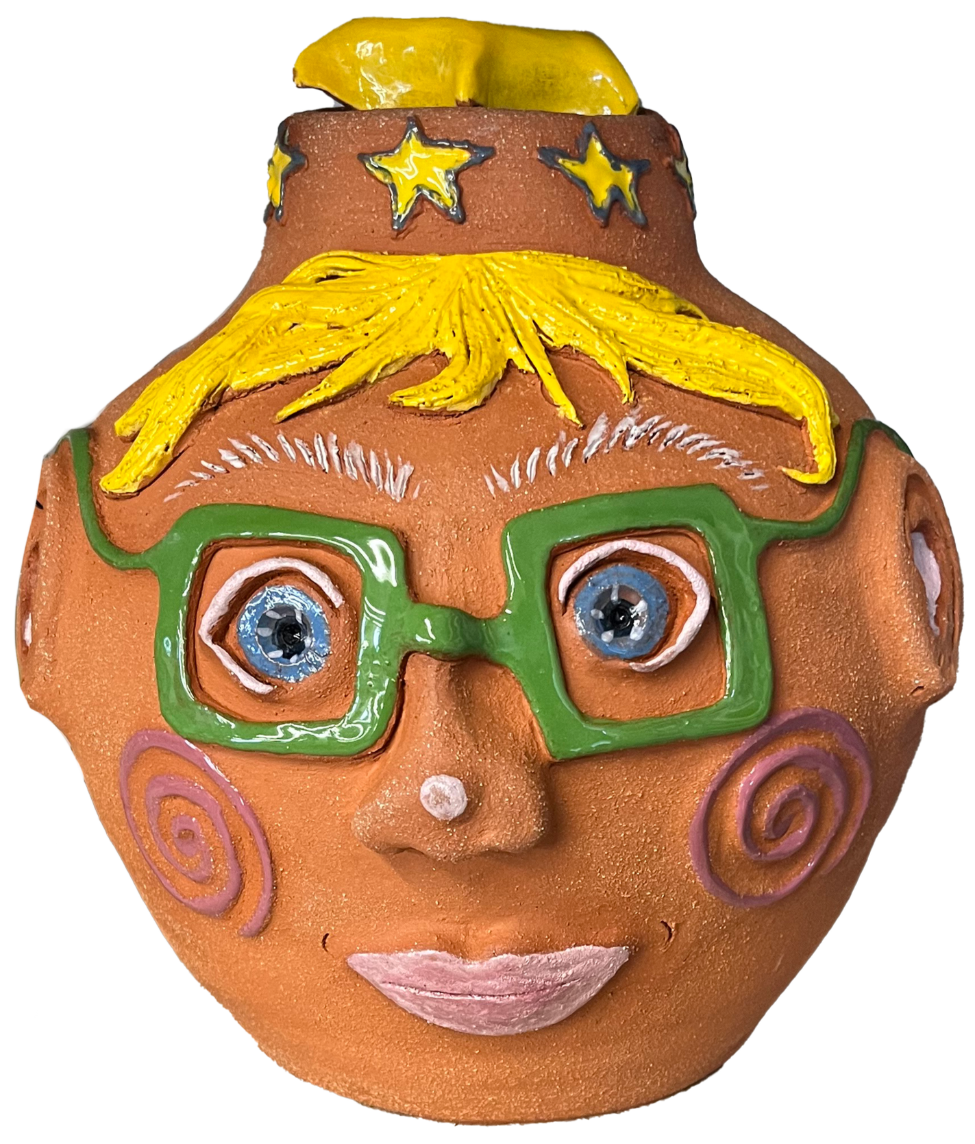 Decorated pumpkin with a face, featuring green glasses, blonde hair, pink cheeks, and a yellow star and moon on top.