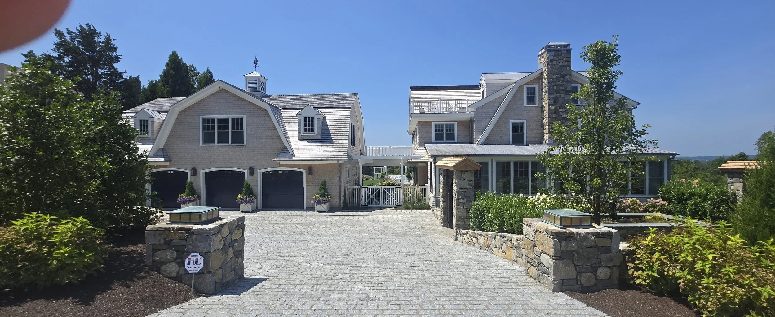 03-Walnut-wood-roofing-shingle-siding-jamestown-RI-slate-and-copper.webp