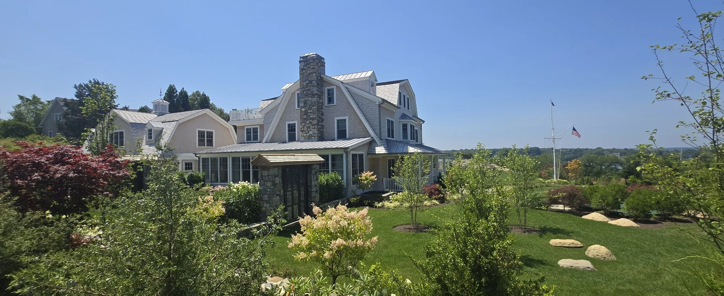 05-Walnut-wood-roofing-shingle-siding-jamestown-RI-slate-and-copper.webp