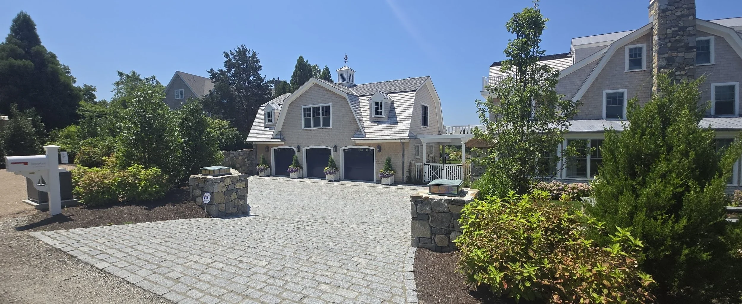 04-Walnut-wood-roofing-shingle-siding-jamestown-RI-slate-and-copper.webp