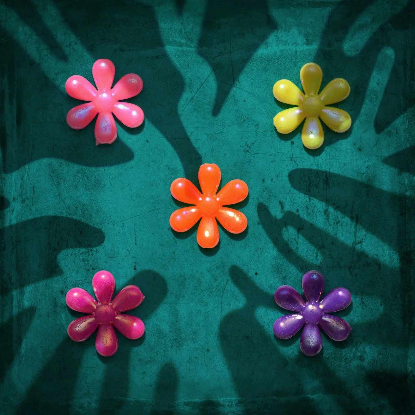 Feeling flat? Get a colour injection.

This is what happens when childhood nostalgia meets bold, modernist structure. These tiny, playful petals are locked into a grid, refusing to be ordinary. The light is aggressive, casting squiggly, chaotic shado