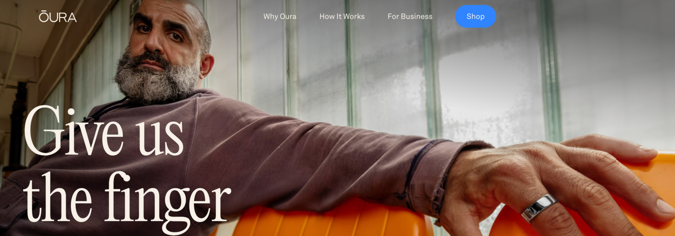 Oura ring ad that says "Give us the finger."