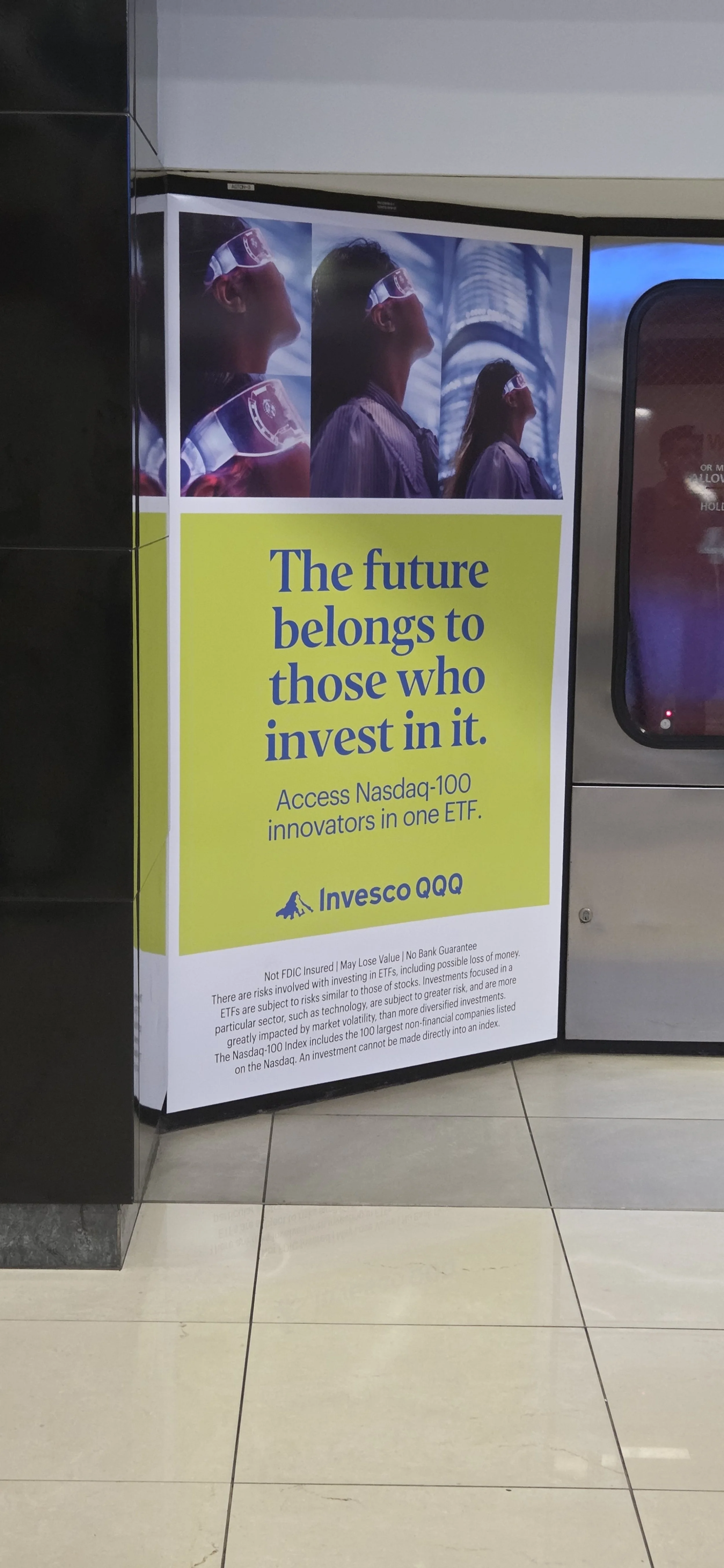Invesco ad in Hartsfield-Jackson International Airport in Atlanta, Ga.