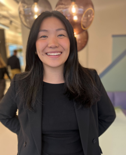 Image of me, Vivianne Ky, a woman with black hair and big smile.