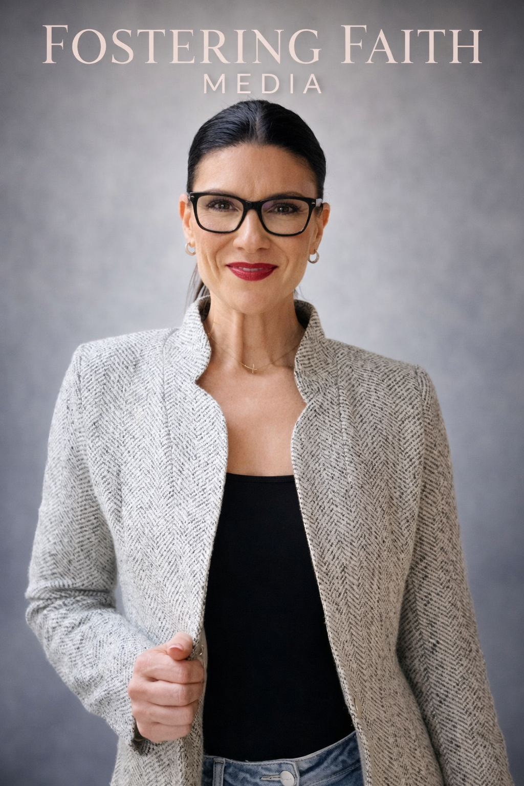 Woman wearing glasses with Fostering Faith branding