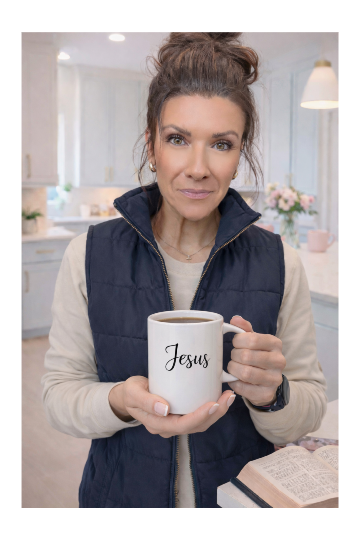 Tracie Foster holding a Jesus mug