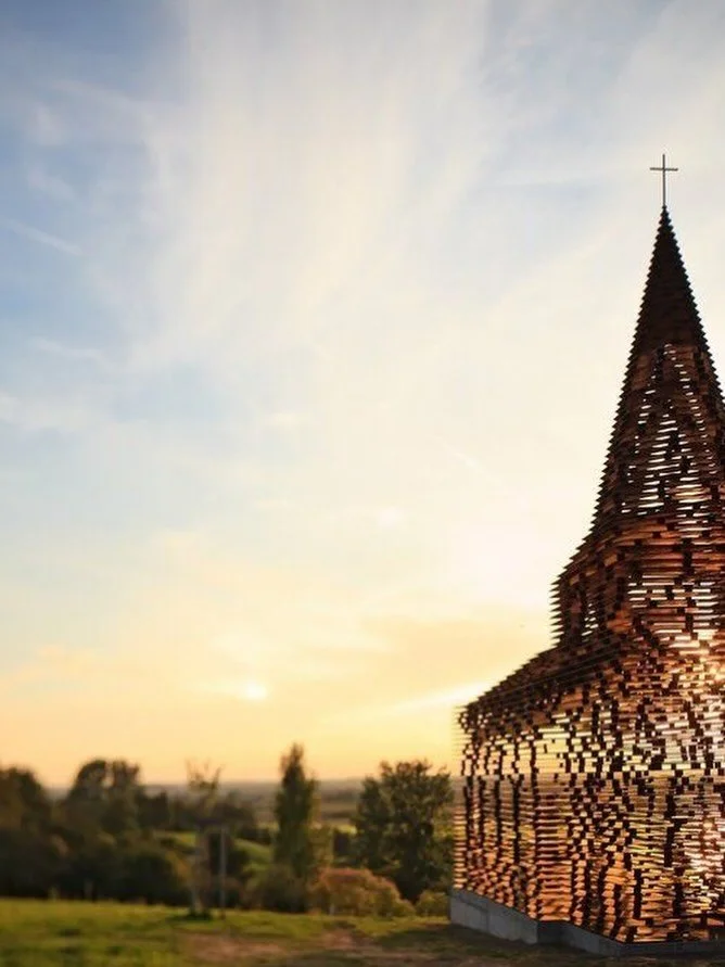 A church made of air, light, and landscape. This is called the &ldquo;Reading Between the Lines&rdquo; church, an installation by two architects in Belgium. Using horizontal layers of steel, the church shape appears solid and complete from certain an
