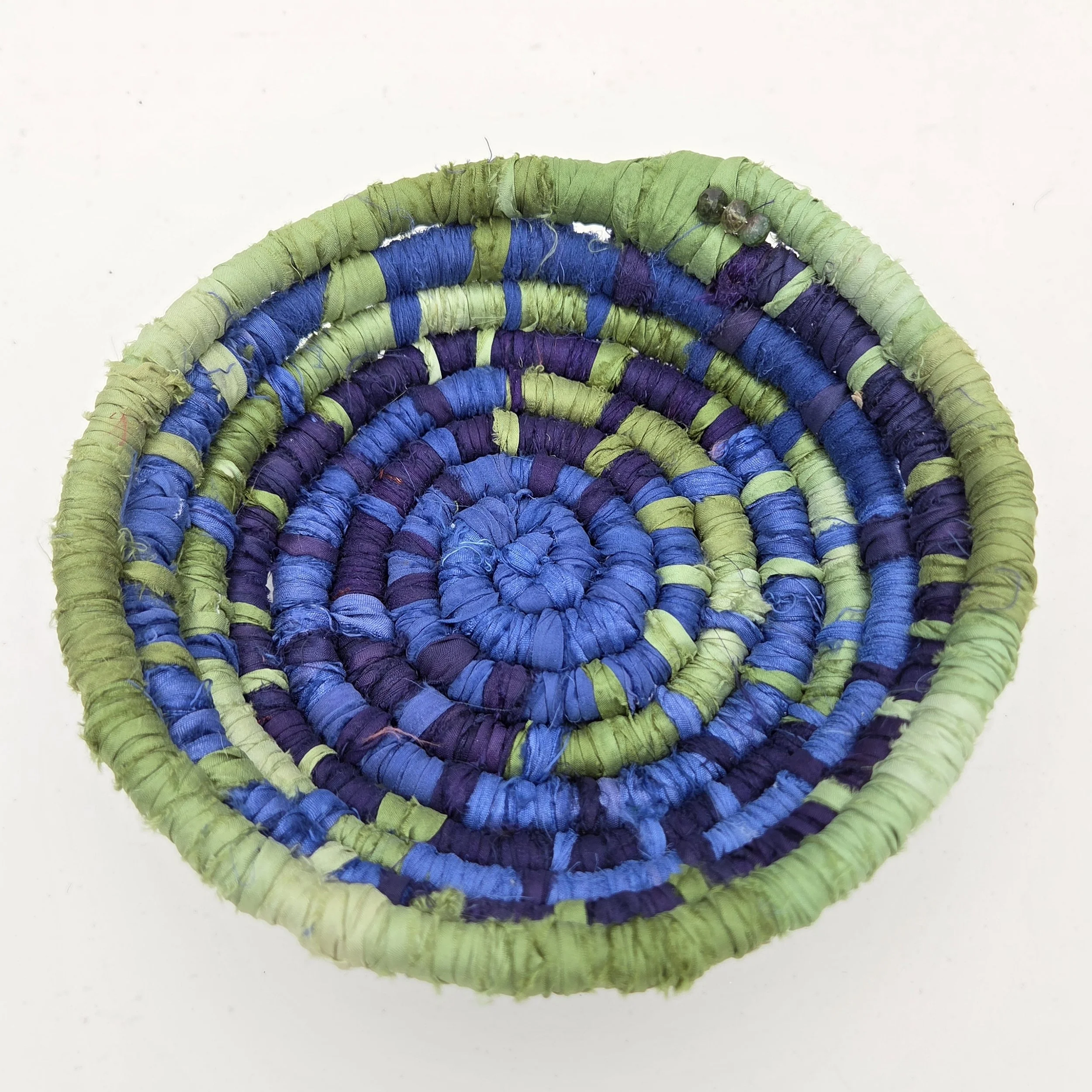 Blue and green handcrafted 2"x7" sari silk coiled vessel