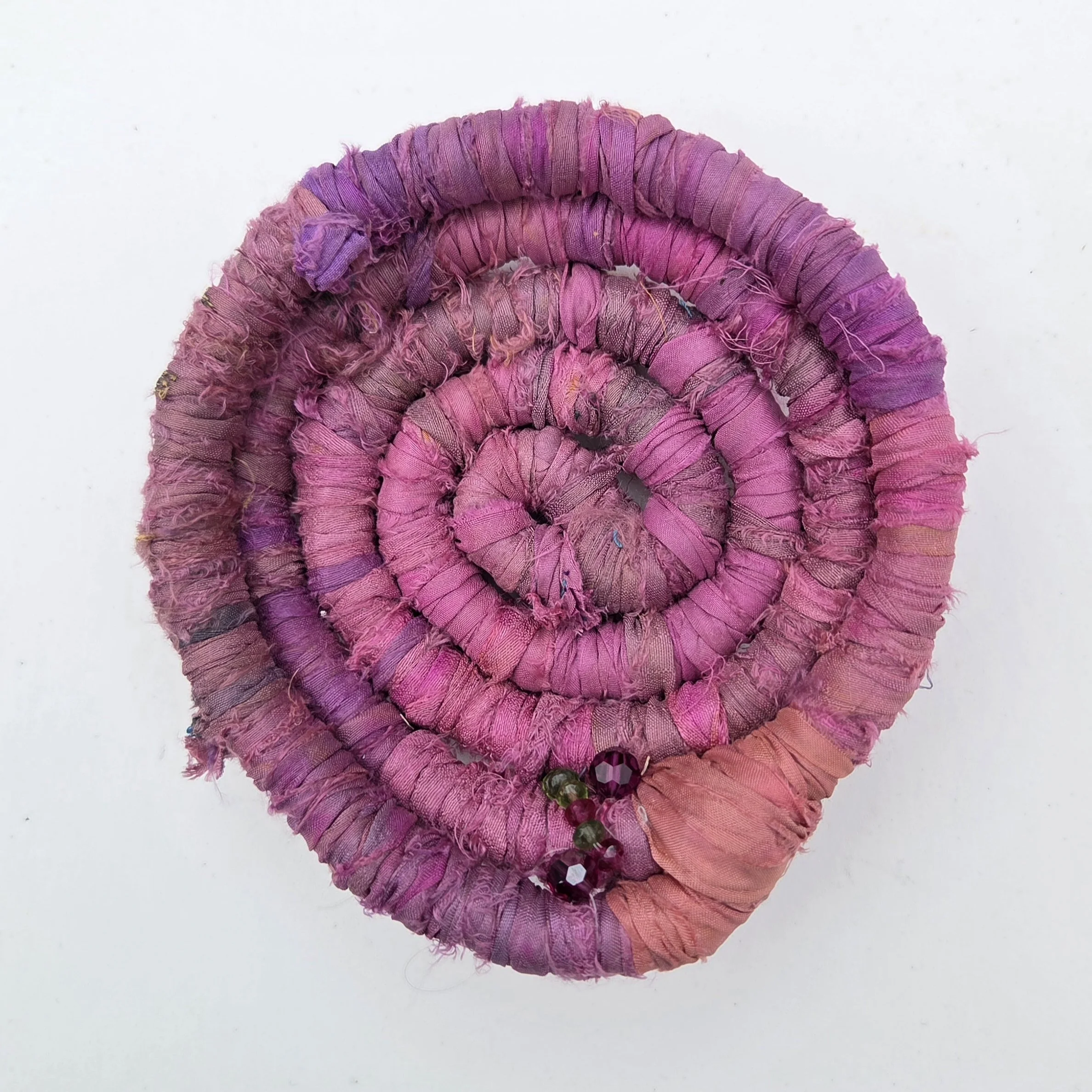 Pink handcrafted 1"x5" sari silk coiled vessel