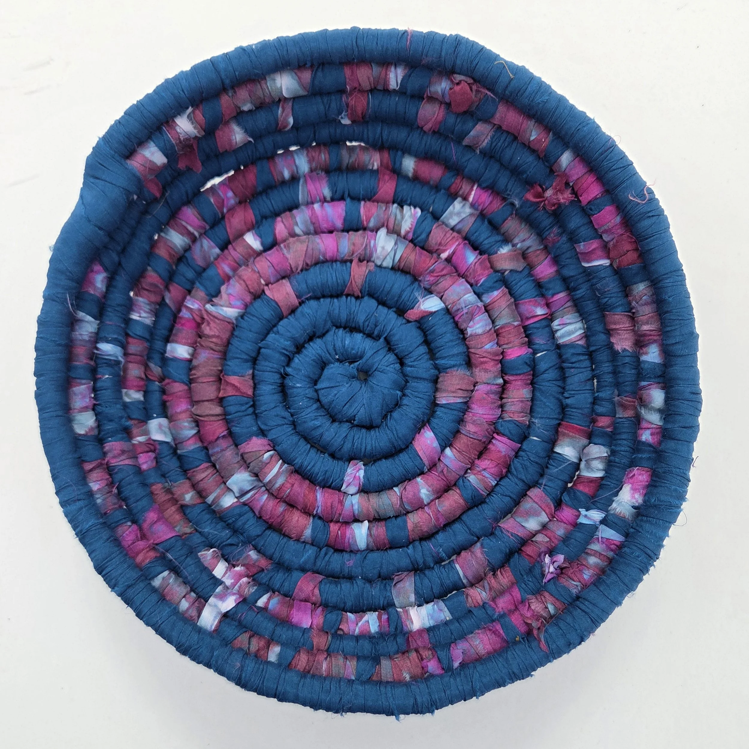 Turquoise and red handcrafted 2"x9" fiber coiled vessel