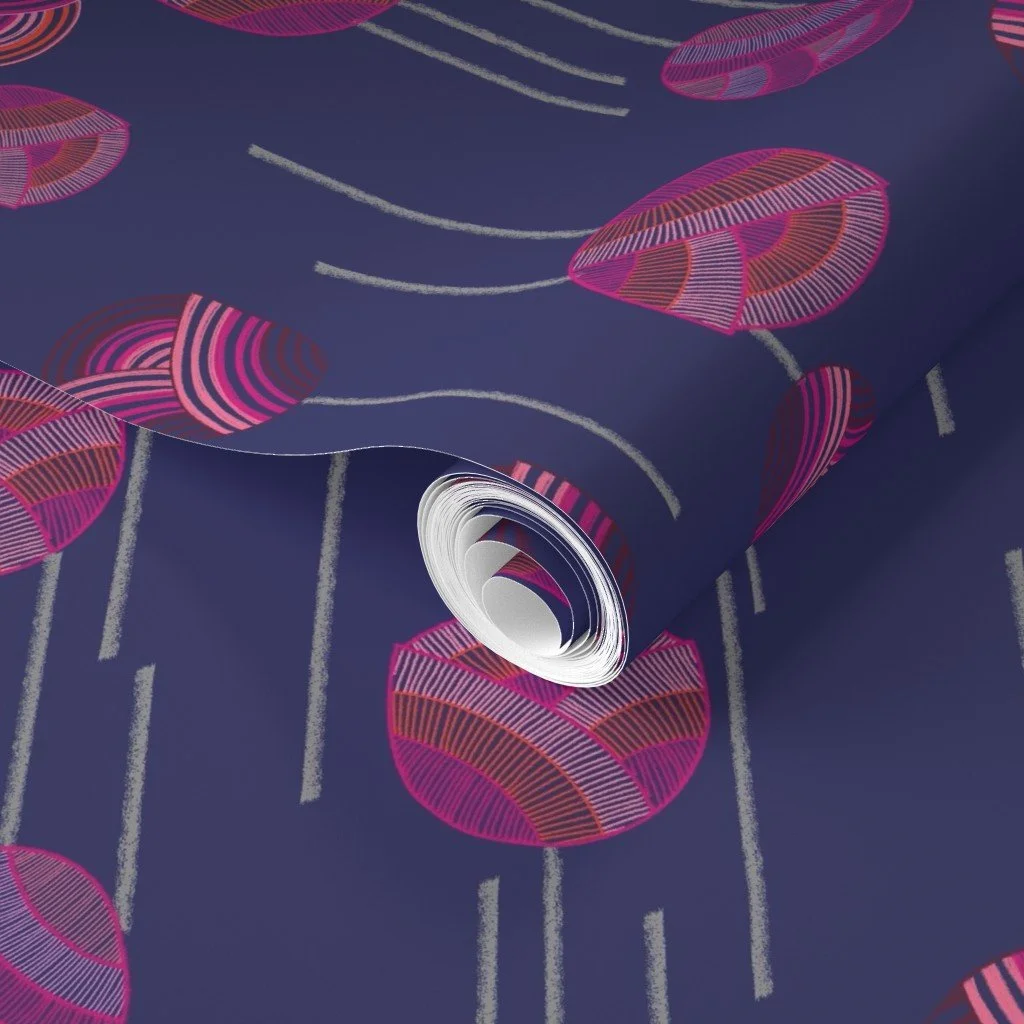 A dancing floral ditsy pattern with abstract tulips and stems on a vibrant dark blue roll of wallpaper