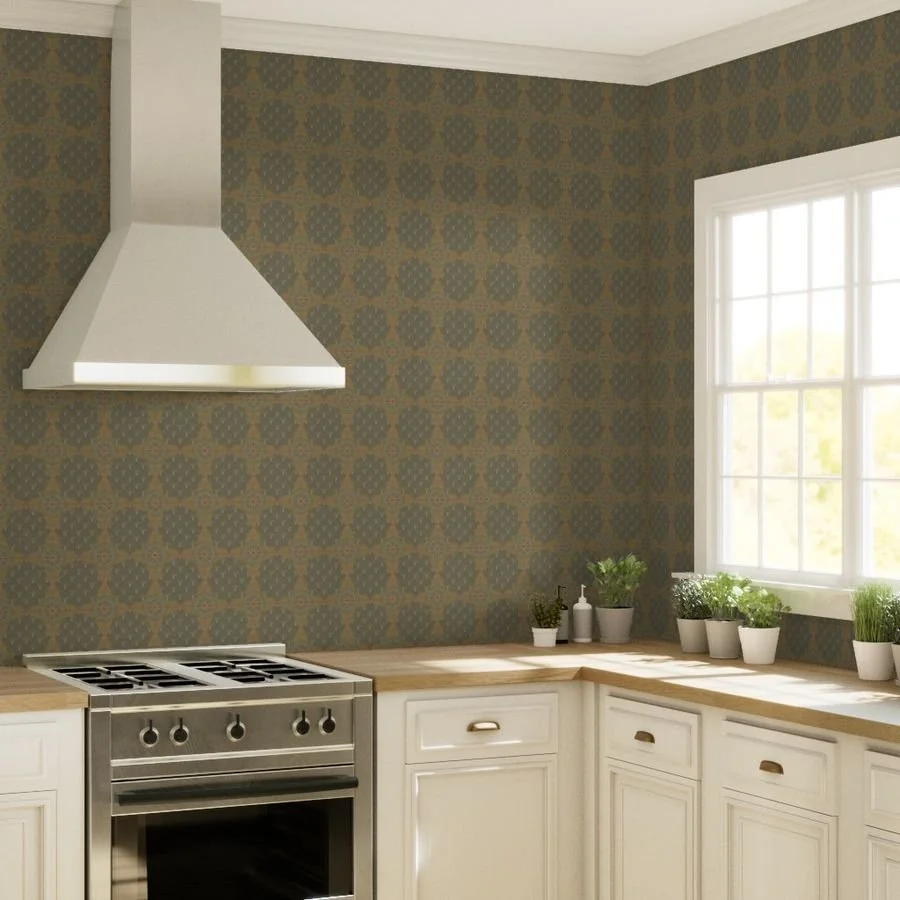 A radial, rose compass and fish scale pattern wallpaper in a bright kitchen with white cabinets, wood countertops, stainless steel oven, and plants in white pots under a window