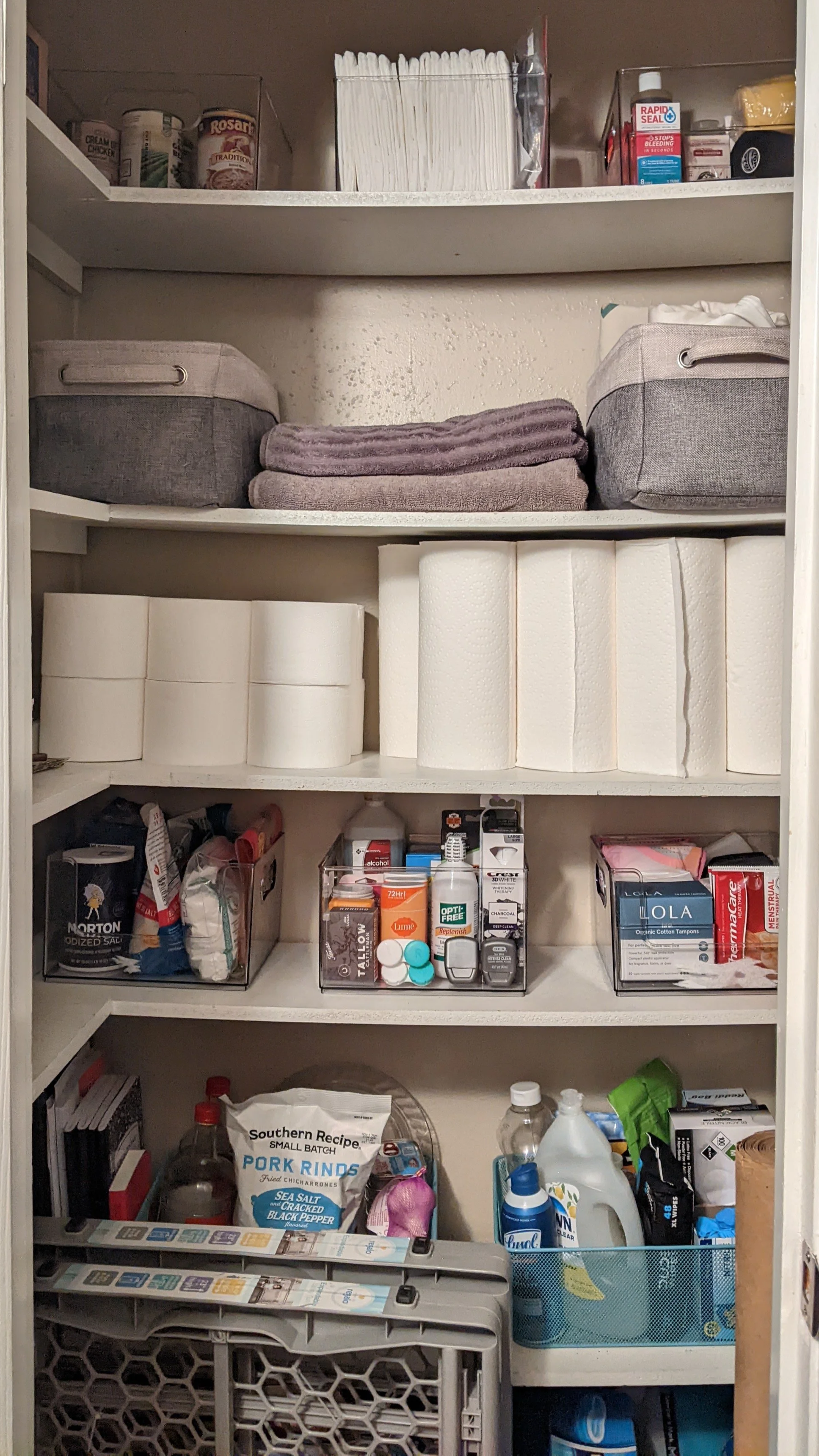 Organized pantry closet bins paper items