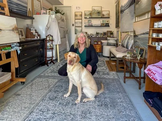 Image of Feona and her dog Marley in the studio