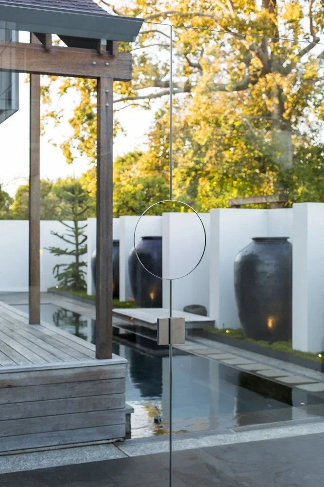 henry-blakely-landscapes-christchurch-glass-door-pond-view.jpg