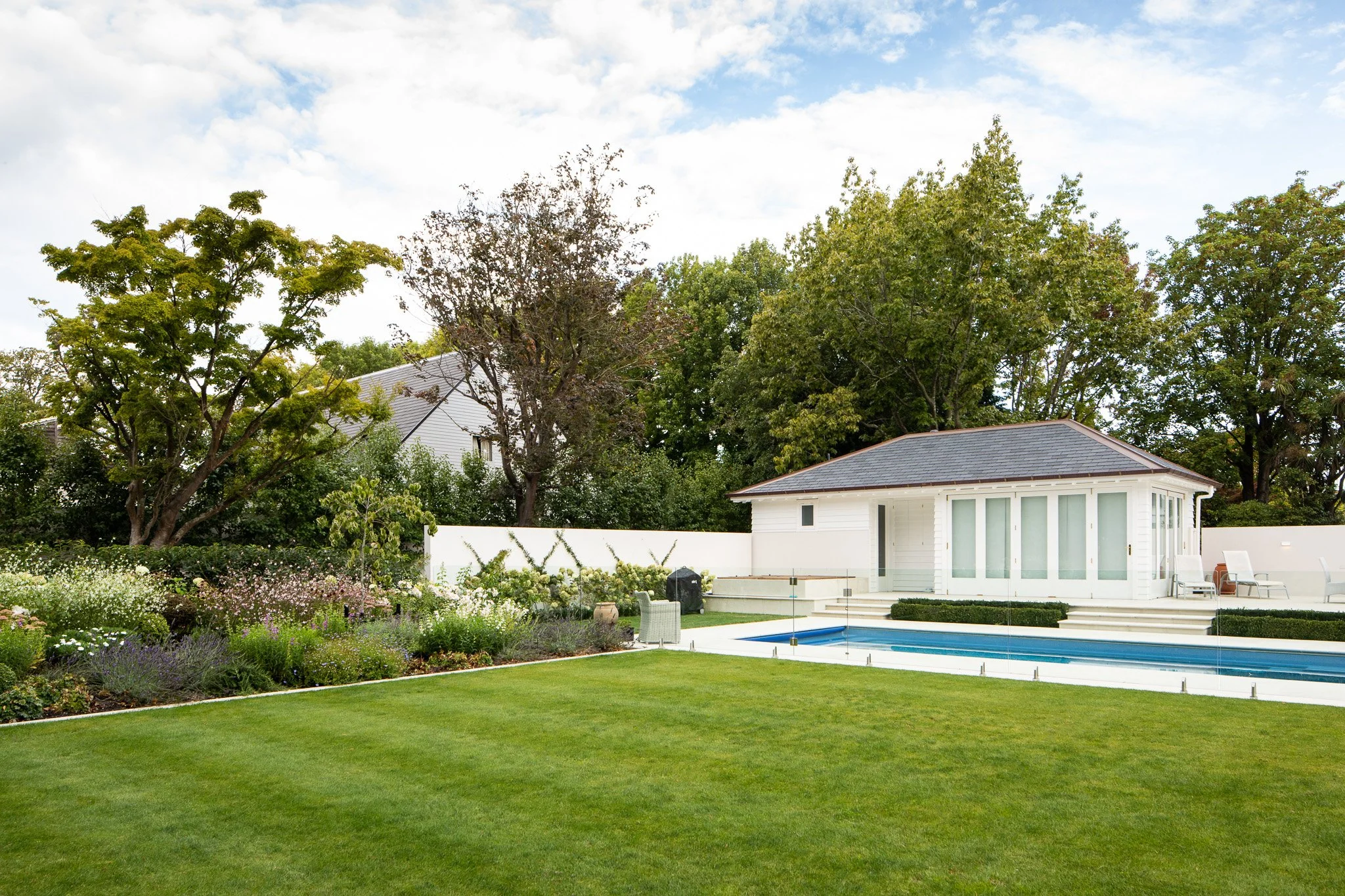 henry-blakely-landscapes-christchurch-traditional-design-poolside-lawn-pavilion.jpg