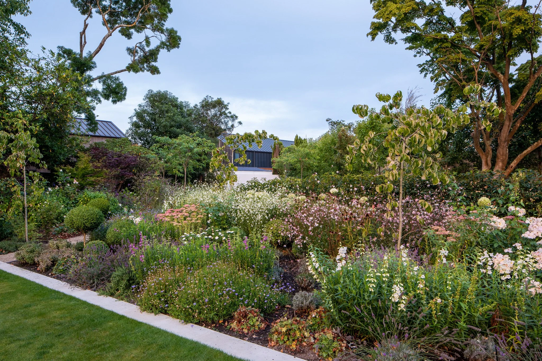henry-blakely-landscapes-christchurch-traditional-design-lush-flower-garden.jpg