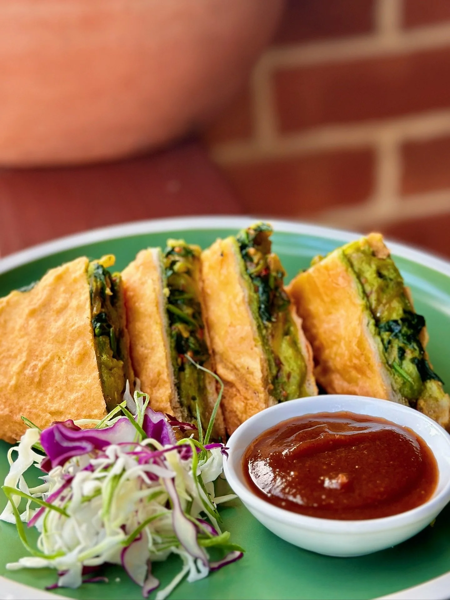 New special from tomorrow 💛
Bread Pakora, a deep-fried sandwich stuffed with spiced potato, onion + mint chutney, served with tamarind sauce on the side.

A crunchy little comfort hit.

8am - 2pm 👋