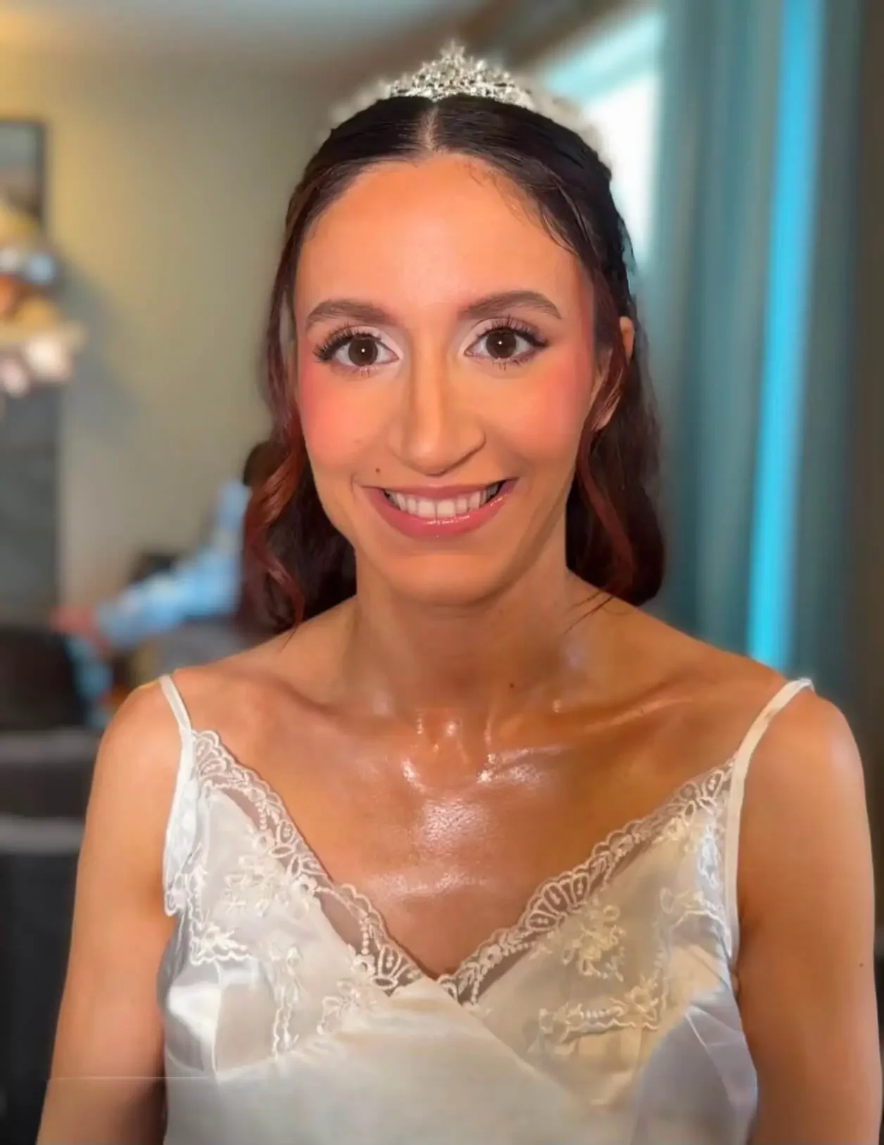 Bride featuring classic glam wedding makeup and elegant updo with tiara styled by North of Blush in Calgary.