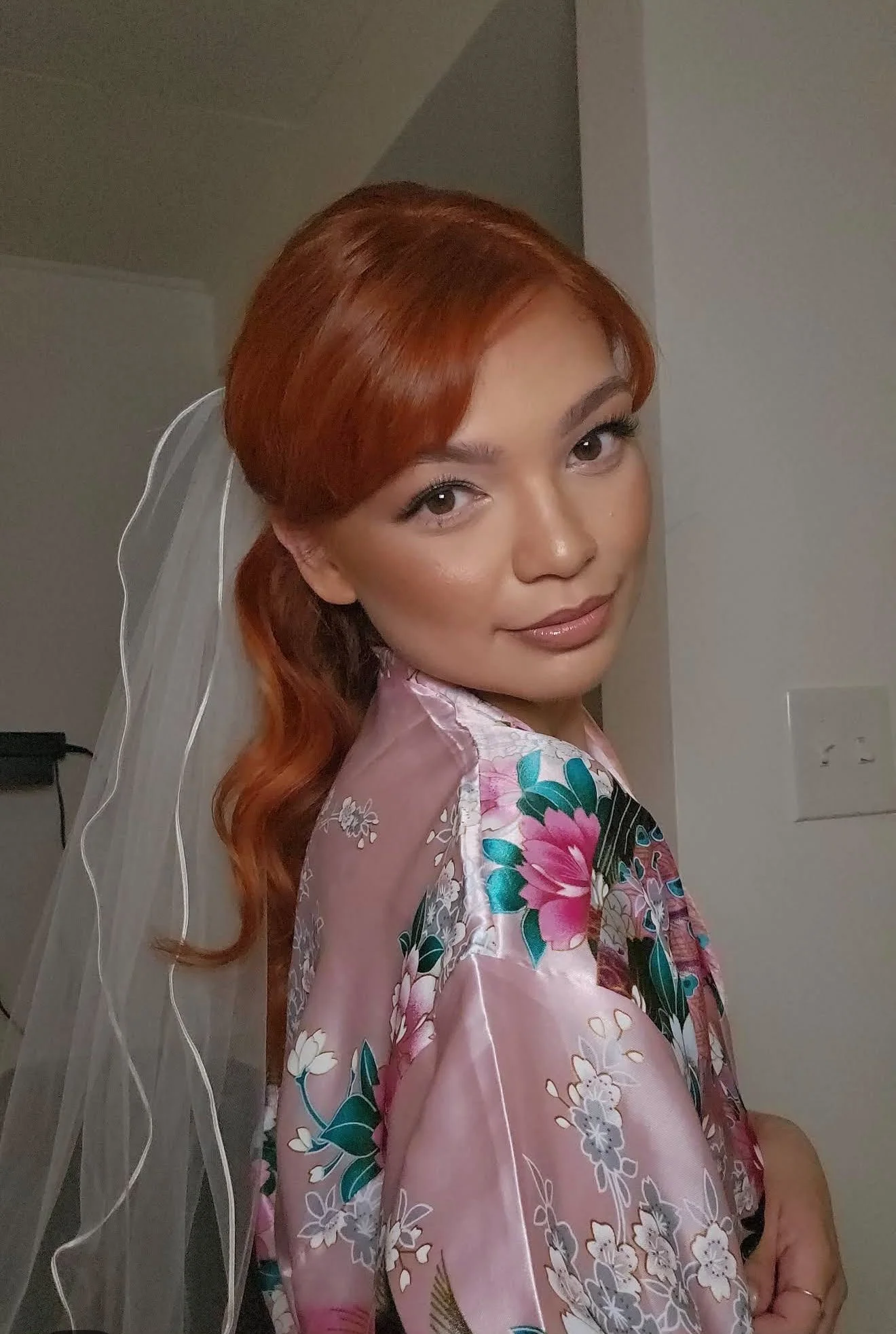 Close-up of glowing, natural soft glam bridal makeup.