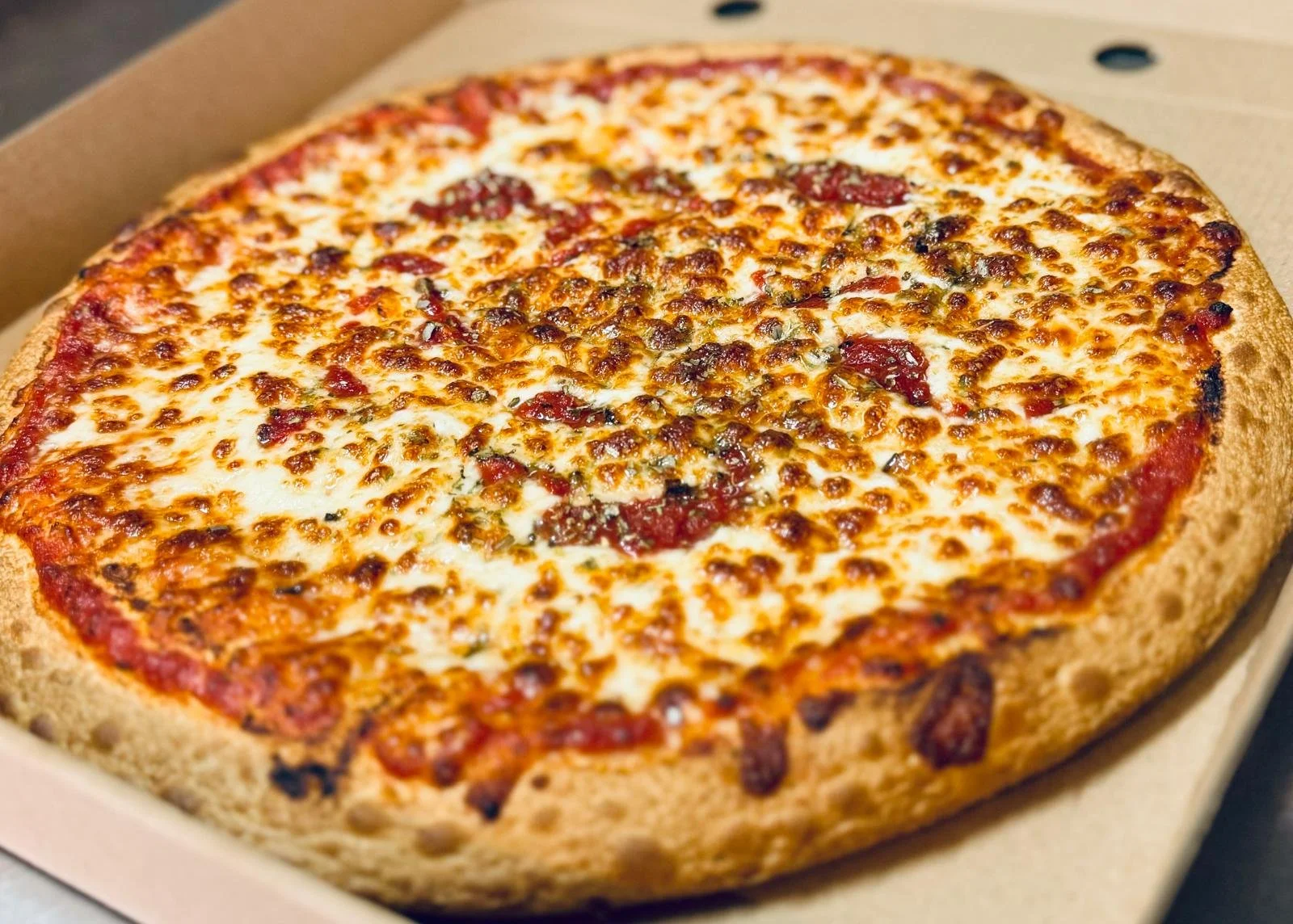 Jessie's Pizza Jessie's Pizza Freshly baked pepperoni and cheese pizza in a cardboard box best pizza in Point Cook