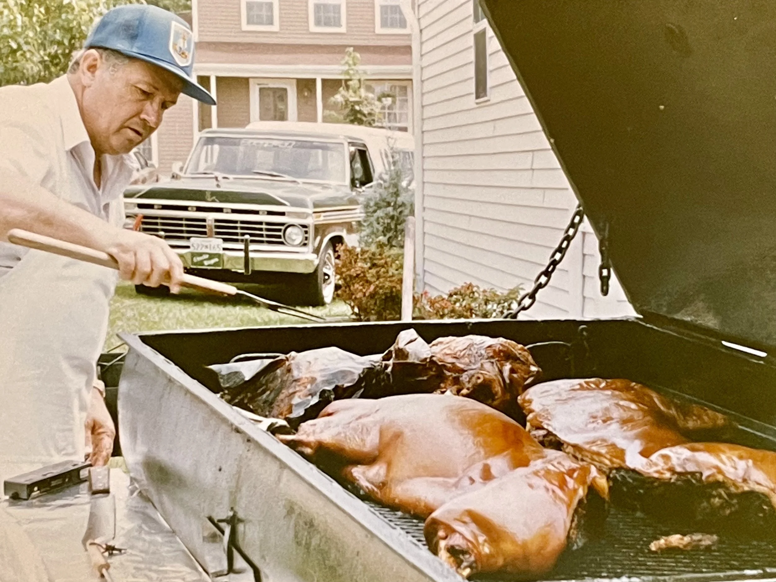 Dad surprising me with a pig pickin' on my first return visit to MD from my new home in GA (1993)