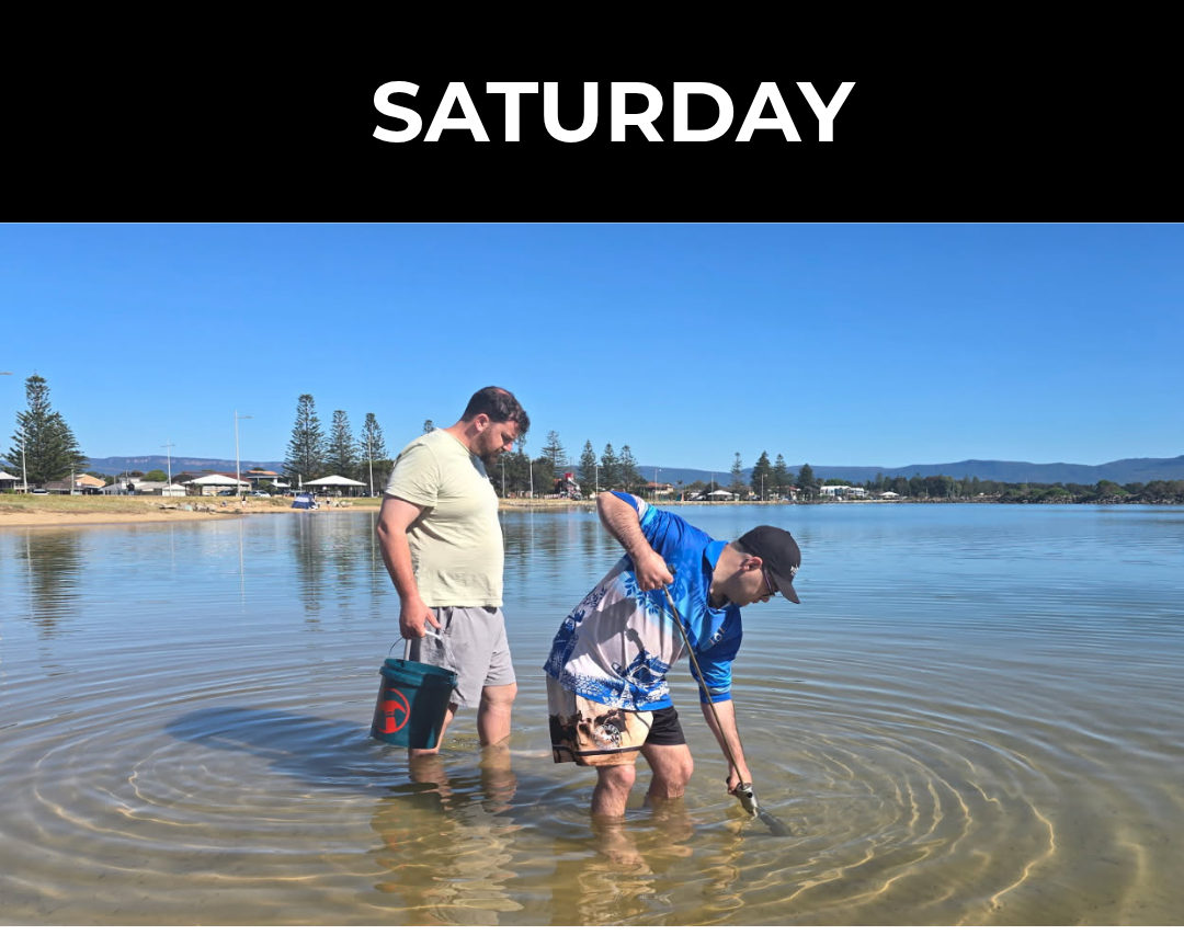 Participants fishing in shallow water during a supported outdoor activity focused on skill building and social connection in the Illawarra region