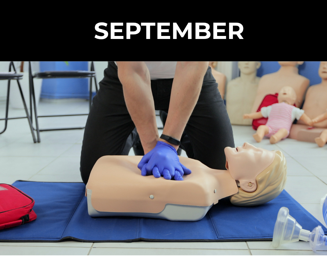 Hands practising CPR on a training mannequin during a supported first aid workshop building practical life skills