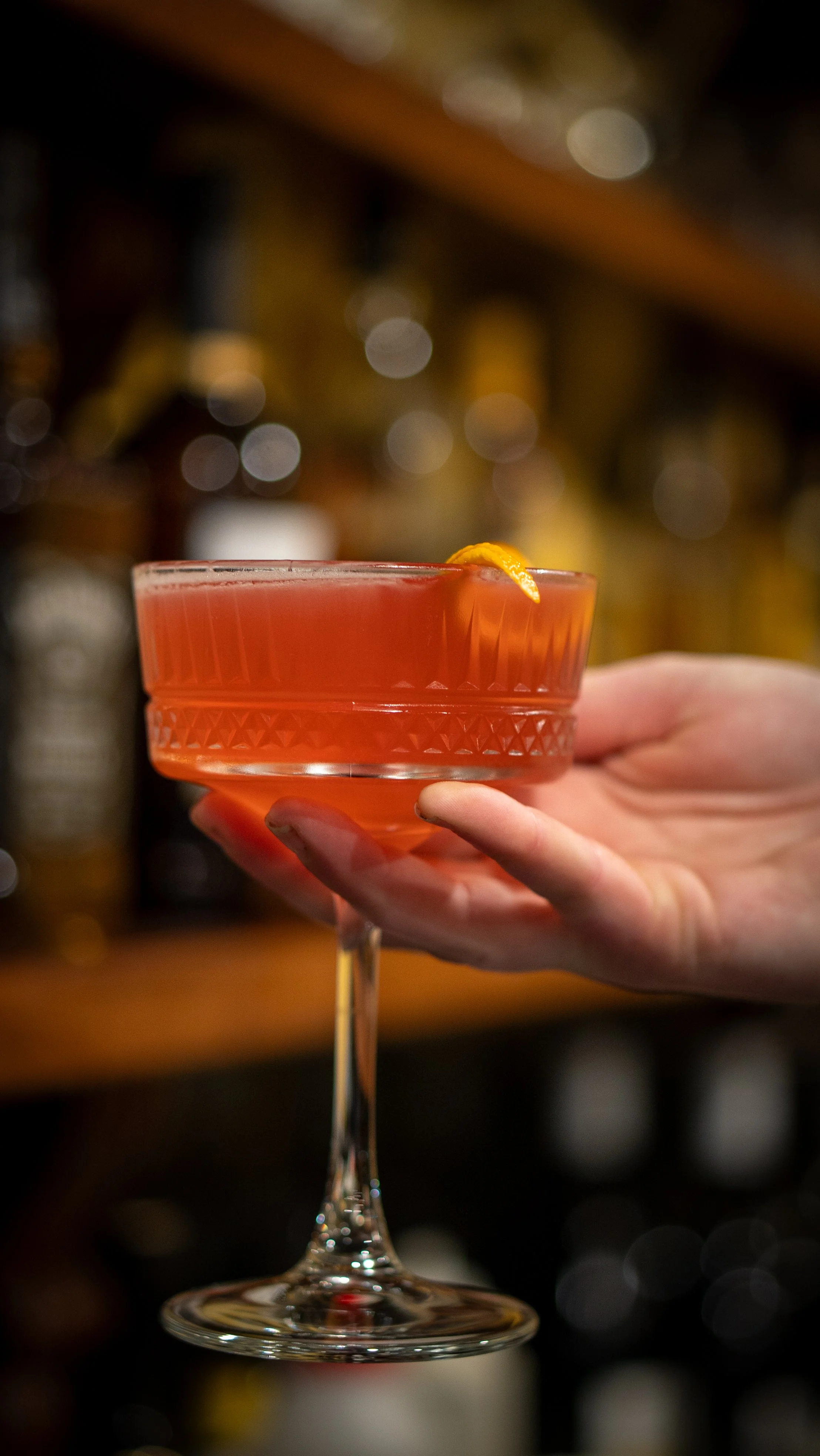 Aperol Spritz cocktail made with Aperol, Italian prosecco, soda water, and a blood orange slice in a glass