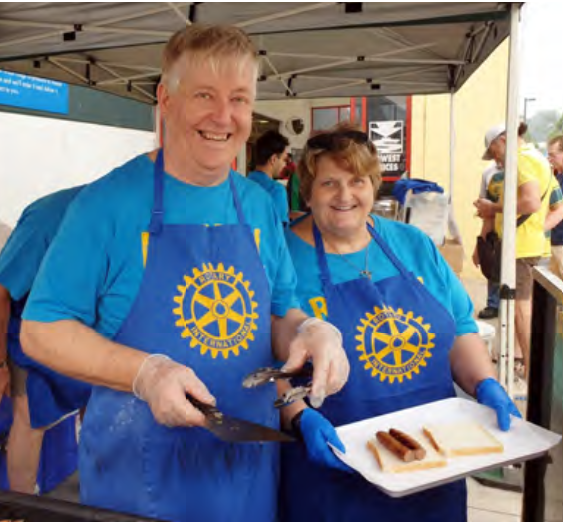 Volunteers at a local BBQ fundraiser event