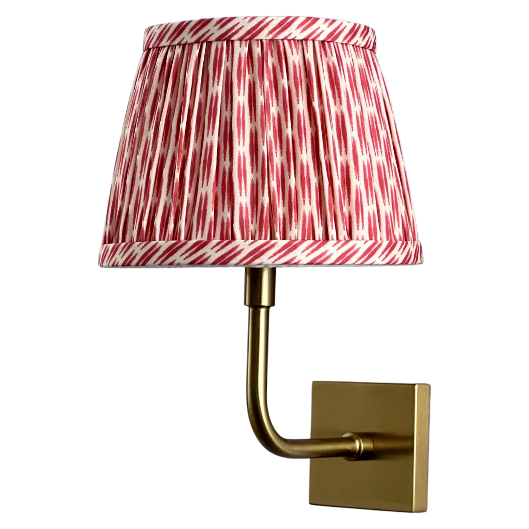 Babington cordless wall light in red, bamboo-engraved metal bracket with fabric shade