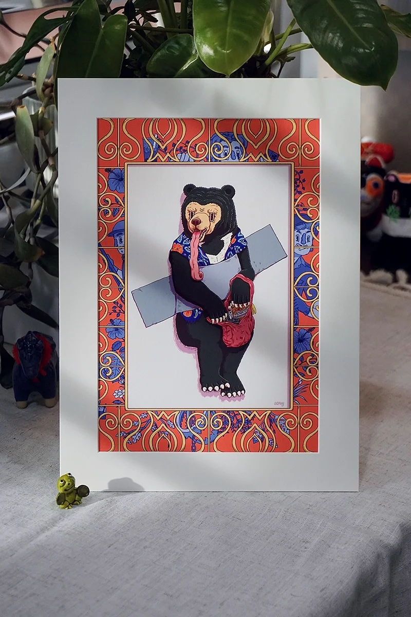 Giclee Print display on table,  <Taped Malayan Sun Bear> from Taped Wildness Series by Malaysia Artist OCMay.