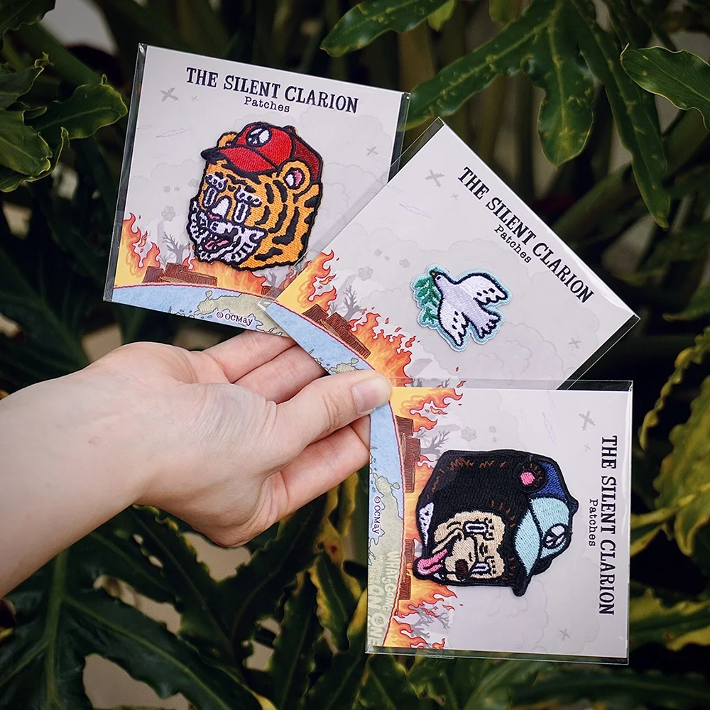 OCMay_The Silent Clarion Patches with packaging copy.webp