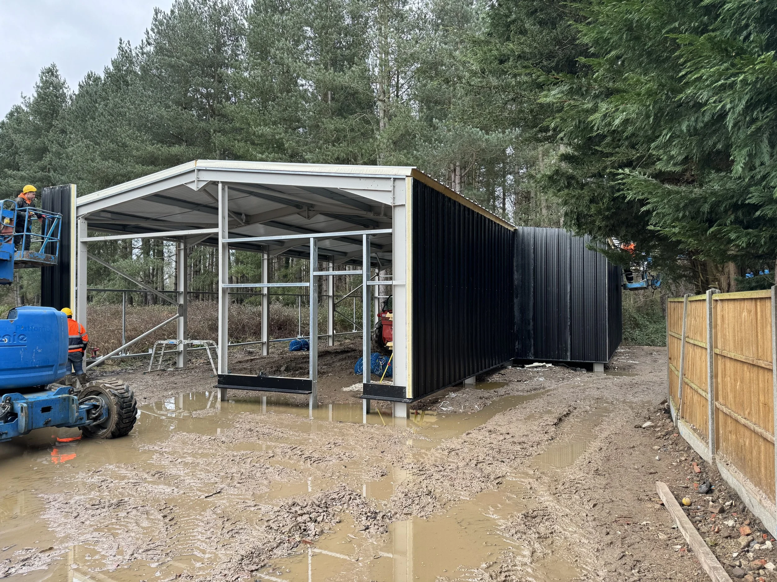 Paintshop cladding going up