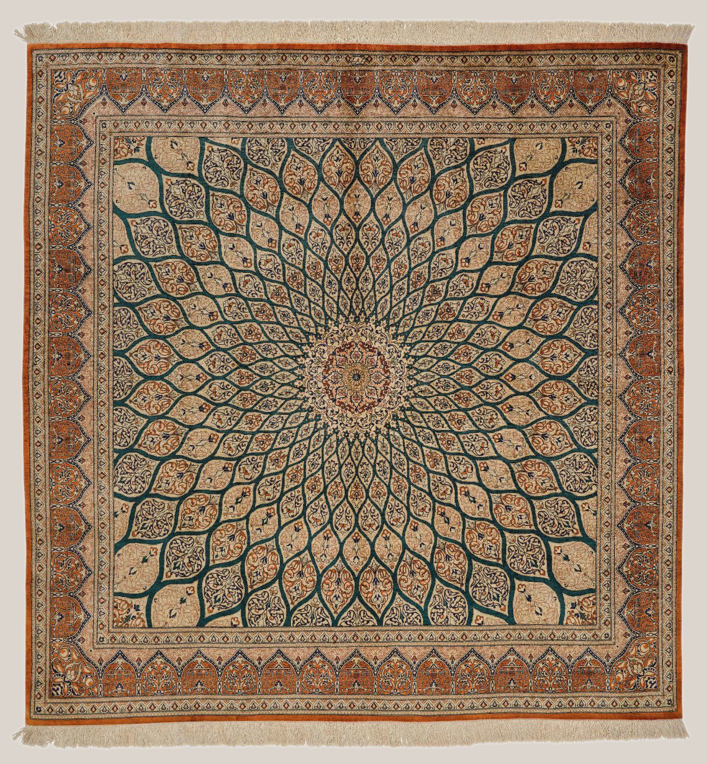 Traditional Persian-style area rug with a central medallion and intricate floral and geometric patterns in beige, blue, and orange tones, featuring a decorative border with similar motifs.
