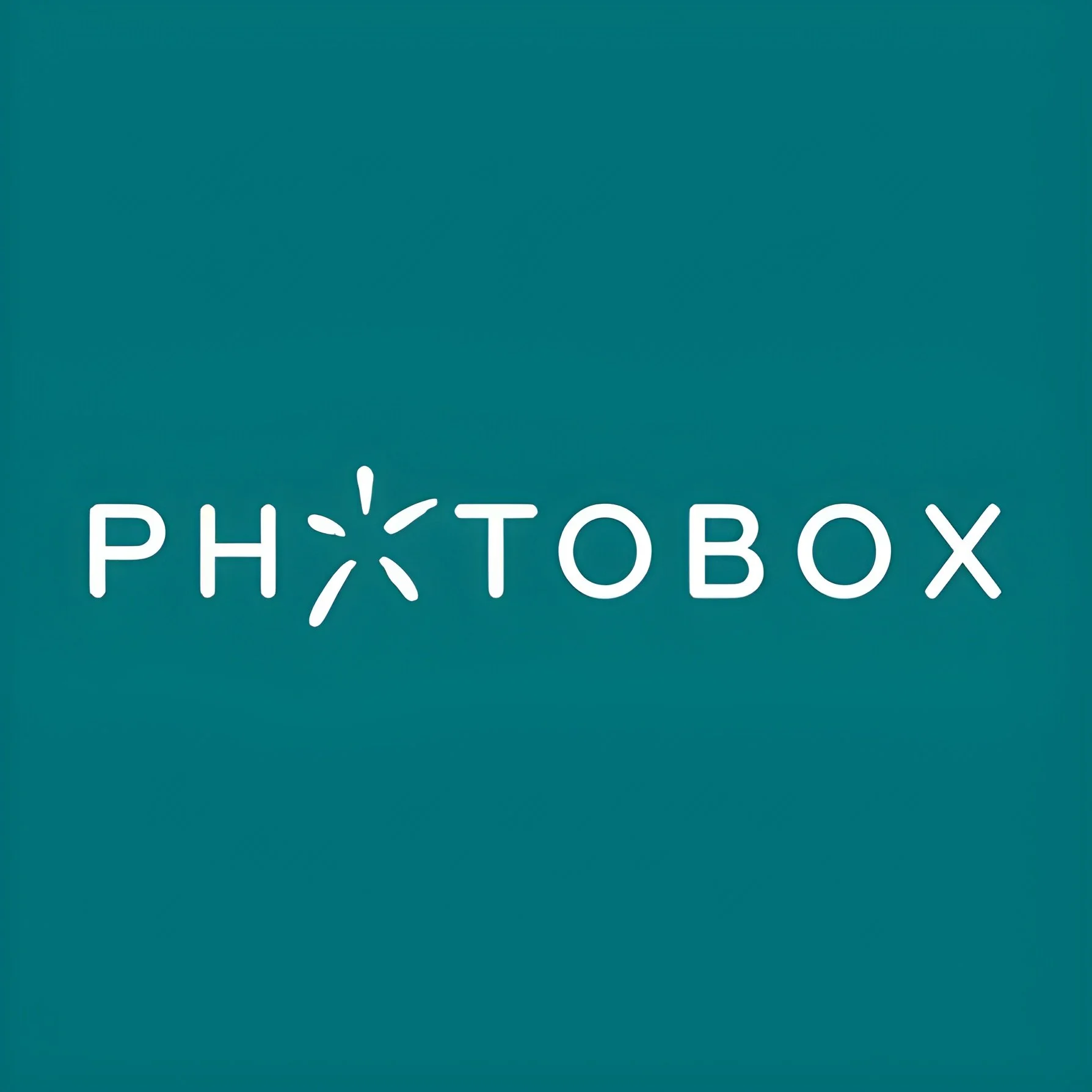 Photobox logo with stylized asterisk in place of the letter 'I'.
