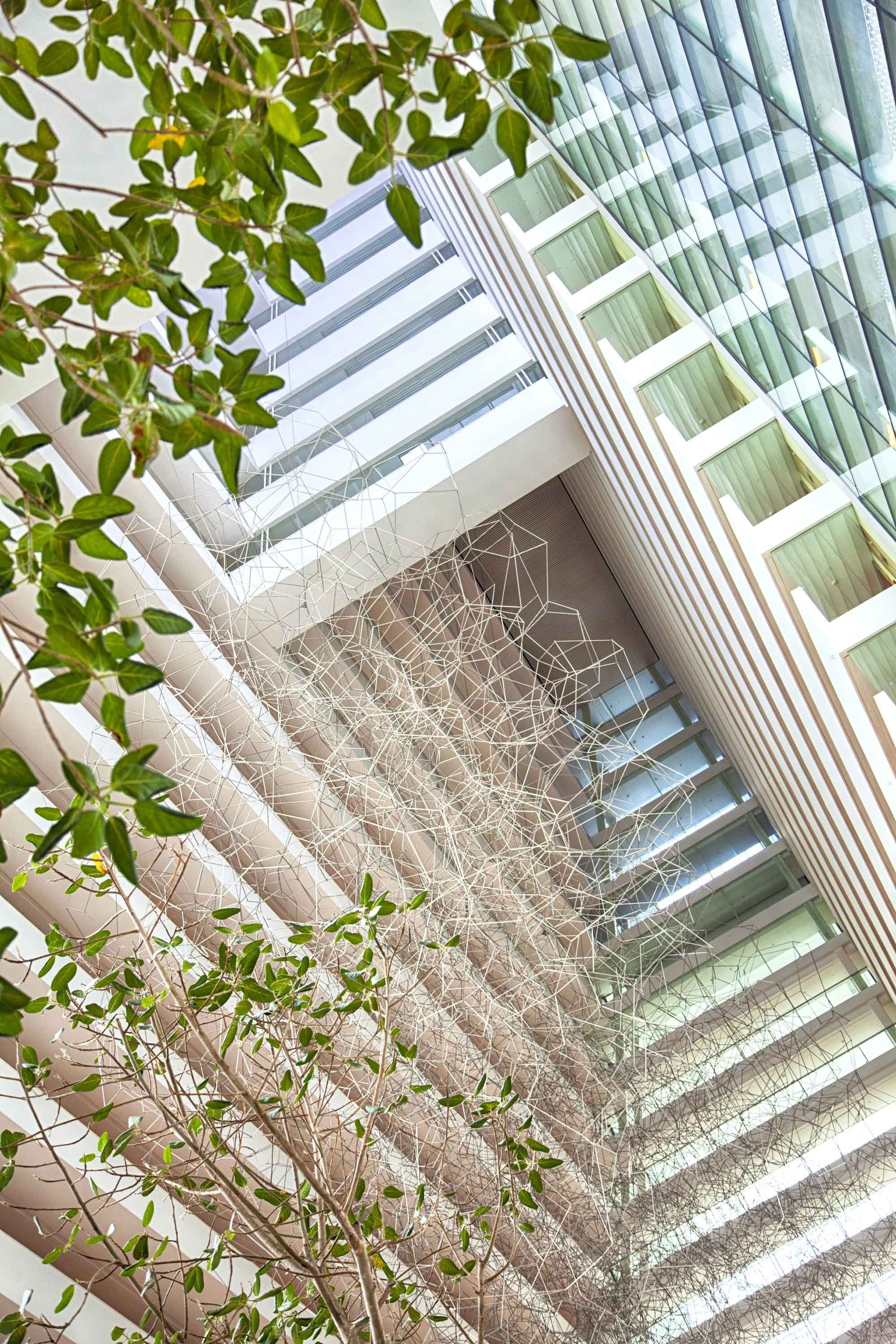 Looking up from a Singapore hotel lobby