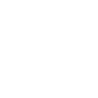 A black circle with a white heart in the center.