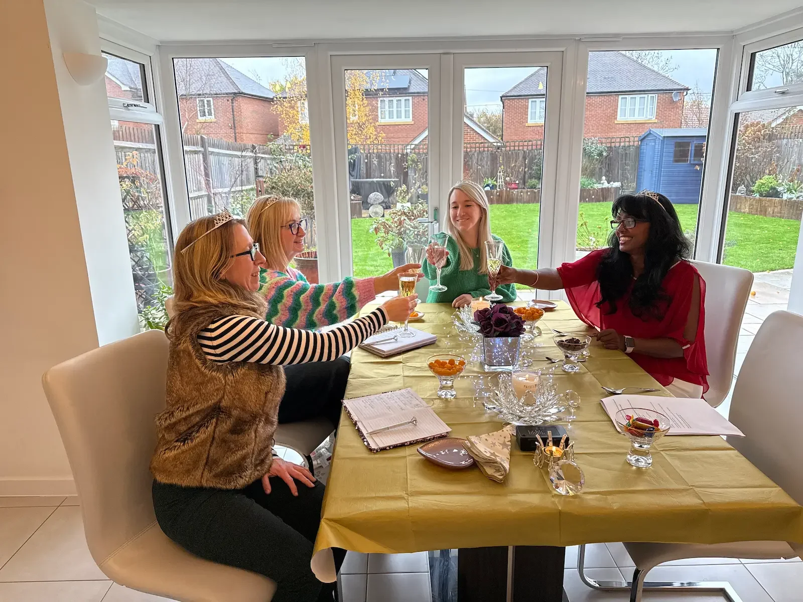 Women celebrating together during the Step Into Your Queen Energy workshop in Reading.