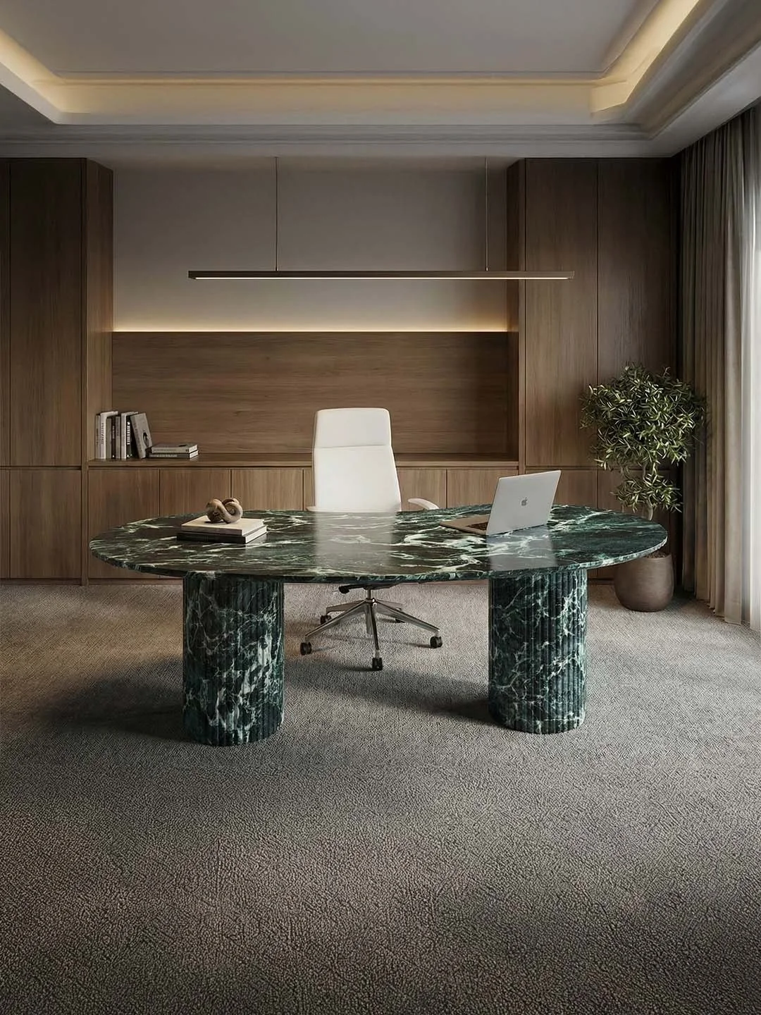 Bureau moderne avec table en marbre vert foncé, chaise blanche, étagère avec livres, ordinateur portable, et plante verte.