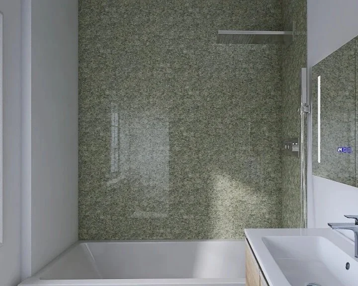 A modern bathroom shower with a textured gray wall, a glass door, a white bathtub, and a white sink with a faucet.
