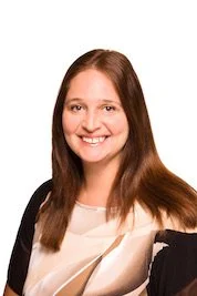 Lady with long straight brown hair smiling